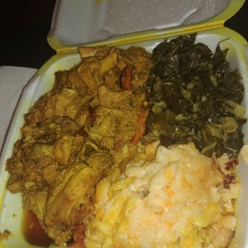 Irie Jamaican Restaurant - Chicken curry with greens and mac and cheese - Caribbean Near Me - Philadelphia, Pennsylvania