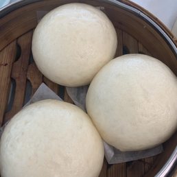 Steam bun with custard and salty egg yolk inside Steam bun with custard and salty egg yolk inside