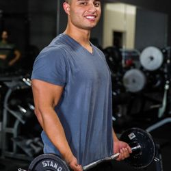 Hybrid Fitness - Coach Nico getting an arm workout in.