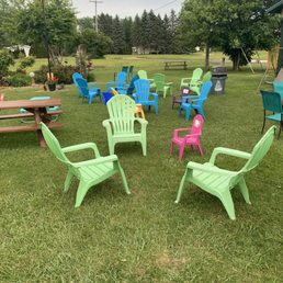 a group of lawn chairs a group of lawn chairs