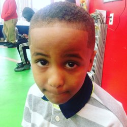 Cut In 4 Quarters - Kyle is awesome! He does a great job on my boys hair! The others barbers are great as well!  Comfortable environment!