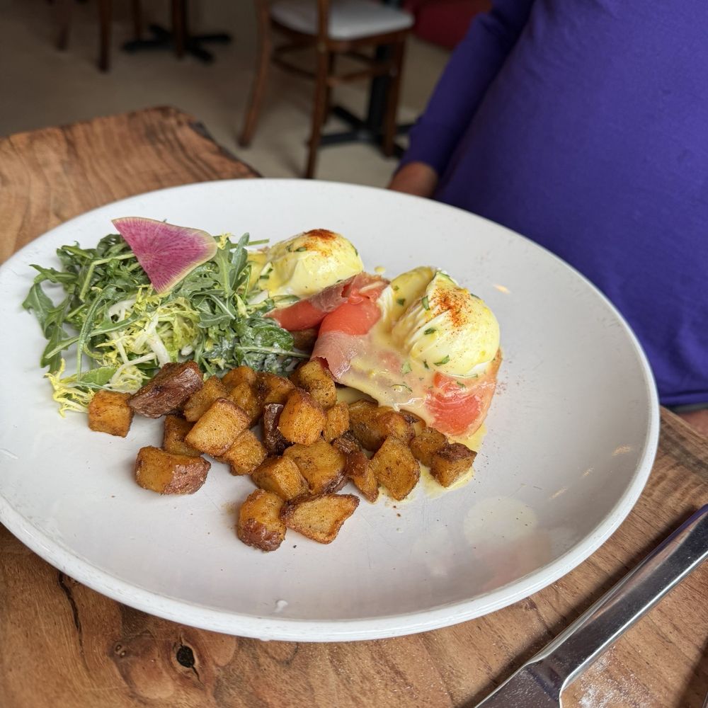 Eggs Benedict with frisée and roasted potatoes Eggs Benedict with frisée and roasted potatoes