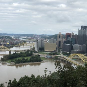 Le Mont - Rivers still swollen from flooding. Point State Park remains partially under water. View from our table - American Near Me - Pittsburgh, Pennsylvania