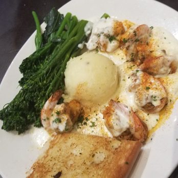 The Rouxpour - Katy - Jumbo shrimp stuffed with boudin in a sauce wit broccoli, garlic mashed potatoes and garlic bread - Cajun/Creole Near Me - Katy, Texas