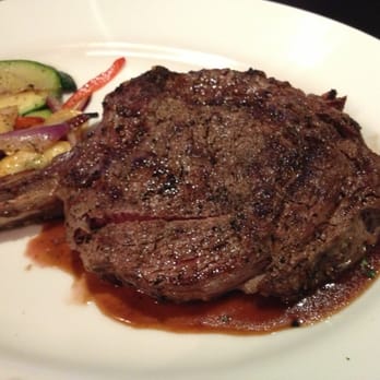 Johnny's Italian Steakhouse - Bone in ribeye - Steakhouses Near Me - Eau Claire, Wisconsin Johnny's Italian Steakhouse - Bone in ribeye - Steakhouses Near Me - Eau Claire, Wisconsin
