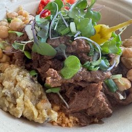 Caravan Spice Beef Chef Wafa Bowl - cumin beef over fluffy couscous