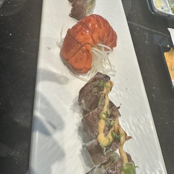 Sakura Sushi - Millionaire roll. Deep fried lobster in middle with avocado topped with steak delish! - Sushi Bars Near Me - Temecula, California Sakura Sushi - Millionaire roll. Deep fried lobster in middle with avocado topped with steak delish! - Sushi Bars Near Me - Temecula, California