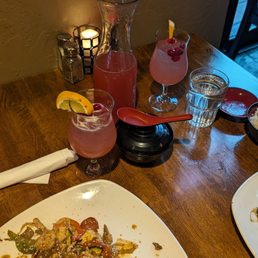Table with the finished meal. Rice and our drink order (1L sangria, rose) Table with the finished meal. Rice and our drink order (1L sangria, rose)