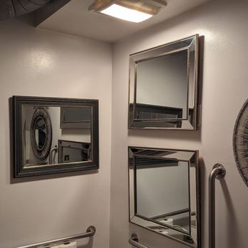 Bailey's Backyard - a bathroom with mirrors on the wall - American Near Me - Ridgefield, Connecticut