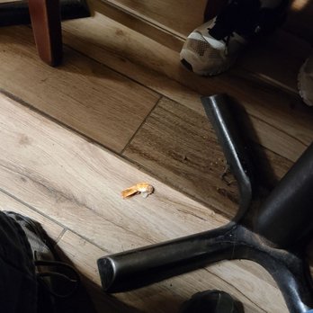 Ajisen Ramen - On the floor visible to the staff but they did not do anything - Ramen Near Me - New York, New York