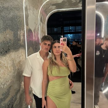 Giselle Miami - Famous mirrored hallway before elevator for photos. - Mediterranean Near Me - Miami, Florida