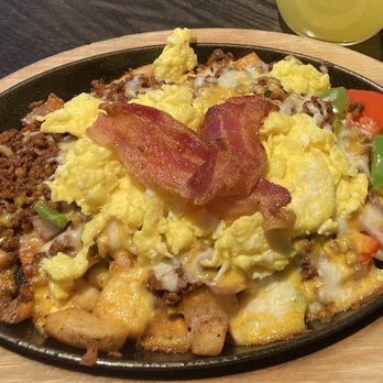 Flowing Tide Pub 8 - South of the border skillet with scrambled eggs - Sports Bars Near Me - Las Vegas, Nevada Flowing Tide Pub 8 - South of the border skillet with scrambled eggs - Sports Bars Near Me - Las Vegas, Nevada