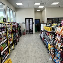 24/7 Mart - Restrooms and soda aisle