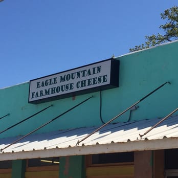 Eagle Mountain Farmhouse Cheese - sign on building - Cheese Shops Near Me - Lipan, Texas Eagle Mountain Farmhouse Cheese - sign on building - Cheese Shops Near Me - Lipan, Texas