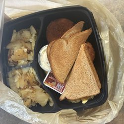 Burkey Family Restaurant - Salmon patties,potatoes and onions and wheat toast.