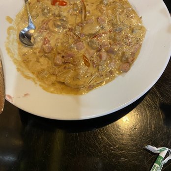 Sunrise Bistro - Shrimp and grits with 3 meats, ham sausage and bacon - Breakfast & Brunch Near Me - Charleston, South Carolina Sunrise Bistro - Shrimp and grits with 3 meats, ham sausage and bacon - Breakfast & Brunch Near Me - Charleston, South Carolina