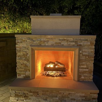 Reid Concrete Construction - Outdoor stacked stone vented fireplace - General Contractors Near Me Reid Concrete Construction - Outdoor stacked stone vented fireplace - General Contractors Near Me