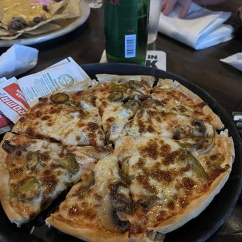 Texas Cafe & Bar - Make your own pizza with jalapeño and mushrooms - Barbeque Near Me - Lubbock, Texas Texas Cafe & Bar - Make your own pizza with jalapeño and mushrooms - Barbeque Near Me - Lubbock, Texas