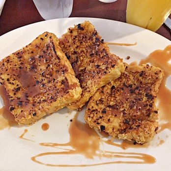 Tim's Place - Frosted flakes encrusted French toast drizzled with the decorate caramel sauce. - Diners Near Me - St. Albans, Vermont