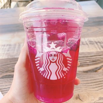 Starbucks - a hand holding a cup of pink drink - Coffee & Tea Near Me - Alhambra, California Starbucks - a hand holding a cup of pink drink - Coffee & Tea Near Me - Alhambra, California