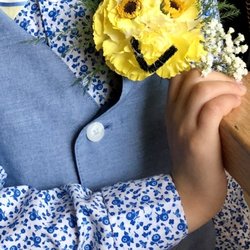 Riverview Florist And Greenhouse - Happy Face within yellow carnations & Viking palm flowers
