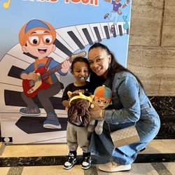 Saenger Theatre - My son and I in front of the Blippi Tour sign in the lobby of the theatre