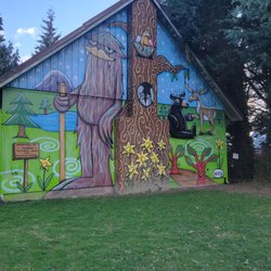 Loyalty Park - A beautiful and cheerful mural facing Loyalty Park. The building is used by The Boy Scouts.