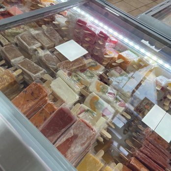 Mi Linda Michoacana - a display of different types of cheese - Desserts Near Me - Caldwell, Idaho
