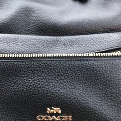 Coach Factory Store - We ended up purchasing luggage, totes, purses, wallets & an umbrella. Glad we could add to our Coach collection.