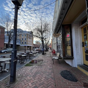 Caphe Banh Mi - a brick sidewalk with tables and benches - Vietnamese Near Me - Alexandria, Virginia Caphe Banh Mi - a brick sidewalk with tables and benches - Vietnamese Near Me - Alexandria, Virginia