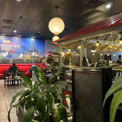Chaiyo Sushi and Thai Cuisine - Waiting area. Note: an automatic 20% service charge is added to parties of 6 or more.