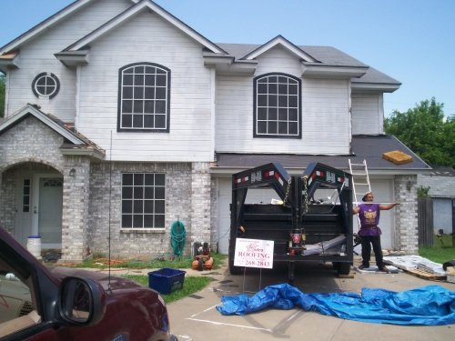 Slide of Astro Roofing