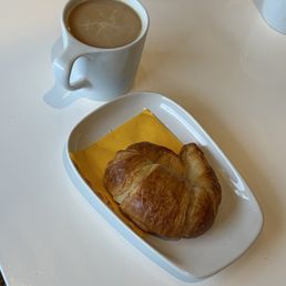 Croissant and decaf Americano with 1/2 & 1/2