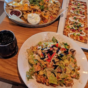 BJ's Restaurant & Brewhouse - Loaded Nachos, Santa Fe Salad, Flat Bread, and Mango Mule. - Pizza Near Me - Slidell, Louisiana BJ's Restaurant & Brewhouse - Loaded Nachos, Santa Fe Salad, Flat Bread, and Mango Mule. - Pizza Near Me - Slidell, Louisiana