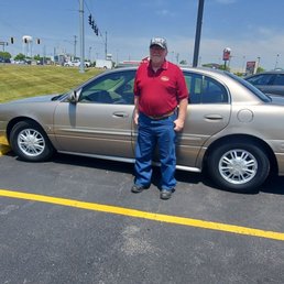 At the Fried Egg restaurant with our new car.