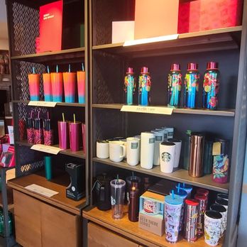 Starbucks - a coffee shop with shelves of coffee and other items - Coffee & Tea Near Me - Wildomar, California Starbucks - a coffee shop with shelves of coffee and other items - Coffee & Tea Near Me - Wildomar, California