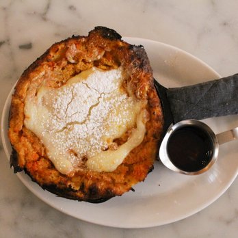 Tilikum Place Cafe - Sweet dutch baby! This has almost a custardy texture. The cream cheese frosting on top was kind of overkill as it ended up being too sweet. - New American Near Me - Seattle, Washington