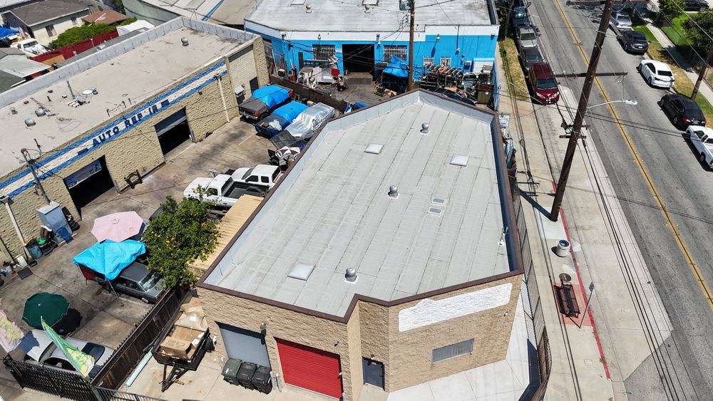 Slide of Meza Roofing Systems