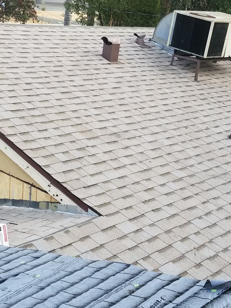 Slide of Quality Roofing Company