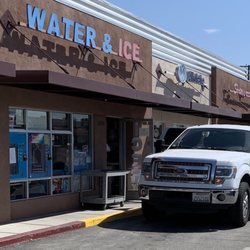 Water and Ice - Work truck stopping by to fill up with the good stuff.