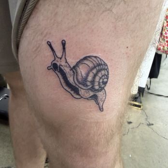 Ink Addiction Tattoos - Snail from flash sheet - Tattoo Near Me - Lexington, Kentucky Ink Addiction Tattoos - Snail from flash sheet - Tattoo Near Me - Lexington, Kentucky