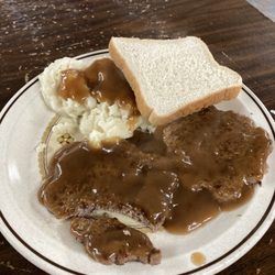 Mellwood Grocery - Hamburger "steak", mashed potatoes, brown gravy, and a slice of bread (it also came with a side salad)