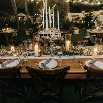Wine Country Florals - greenery and cylinder candle holders - Floral Designers Near Me