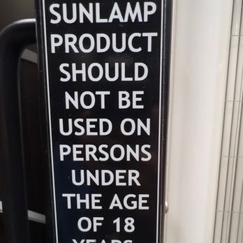 Zoom Tan - Tanning Salon - Warning sign posted on tanning bed - Tanning Near Me - Miami, Florida Zoom Tan - Tanning Salon - Warning sign posted on tanning bed - Tanning Near Me - Miami, Florida