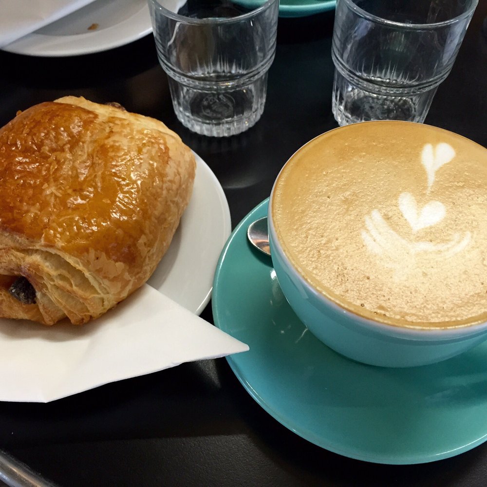Cappuccino done right, with a fresh pain au chocolat!