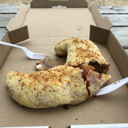 Toastys Fine Grind - Sausage and onion stromboli