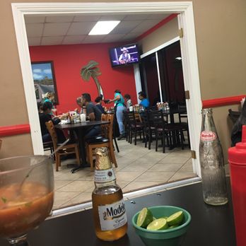 Mariscos Mocorito - Tables and ambience in here is okay but that doesn't matter - Mexican Near Me - Orange, California