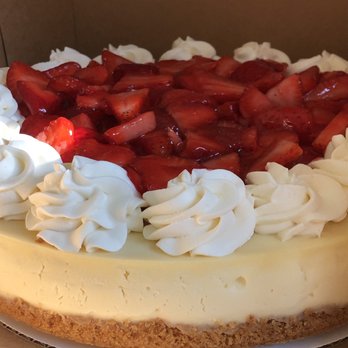 Keep Your Fork - a cheesecake with strawberries and whipped cream - Desserts Near Me