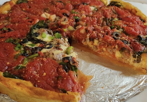 Pan y Pizza Pa' Ya- Irving Park by null