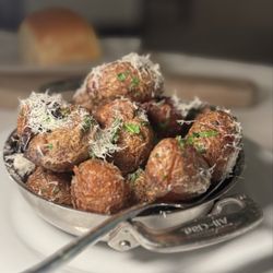 Council Oak Steaks & Seafood - Crispy Fingerling potatoes with Parmesan cheese